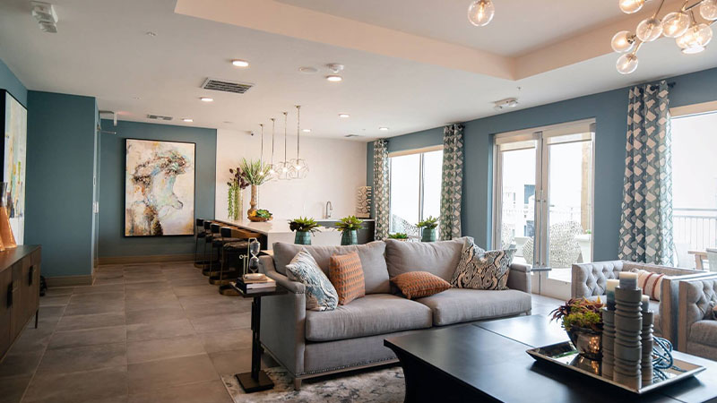 black-wooden-coffee-table-near-white-couch